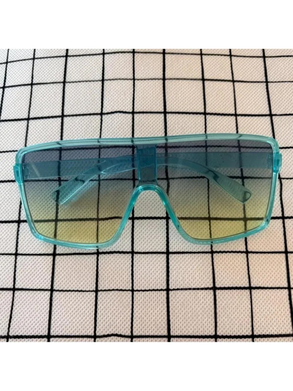 blue and green sporty glasses